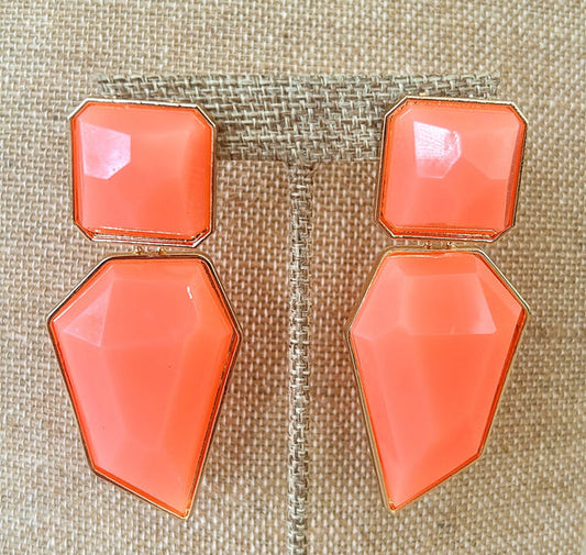 Extra large modern style statement pierced earrings.