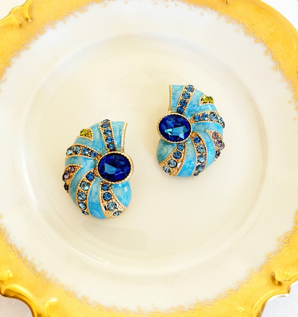 Pierced style nautilus shell style earrings