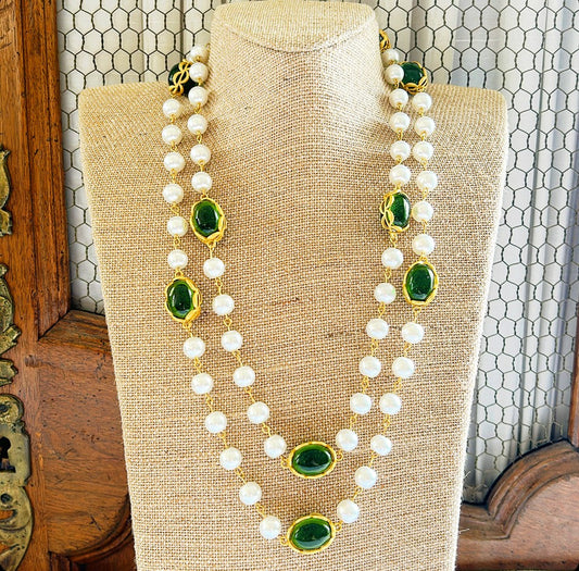 Classic faux pearl ling necklace with large oval shaped green gripoix style stones with gold metal accents