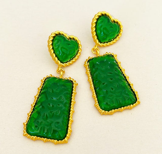 Designer statement pierced dangling earrings.