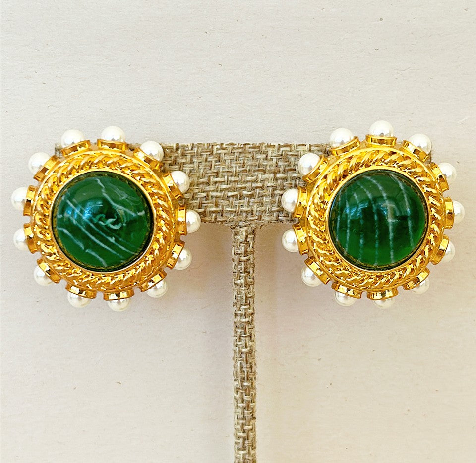 Classic round pierced style earrings with a green faux malachite center stone