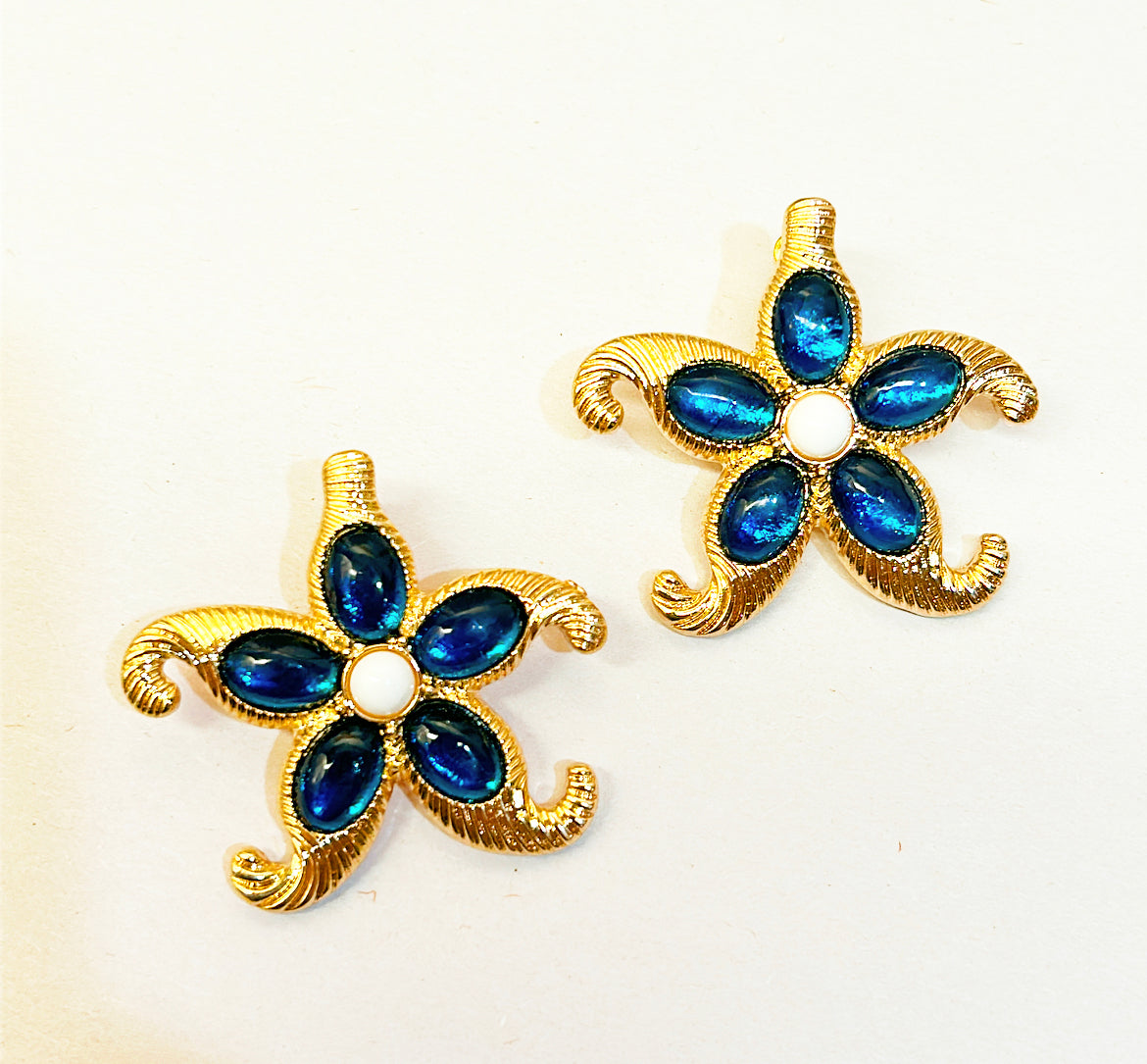 It’s almost summer … get these fabulous starfish designed pierced statement earrings.