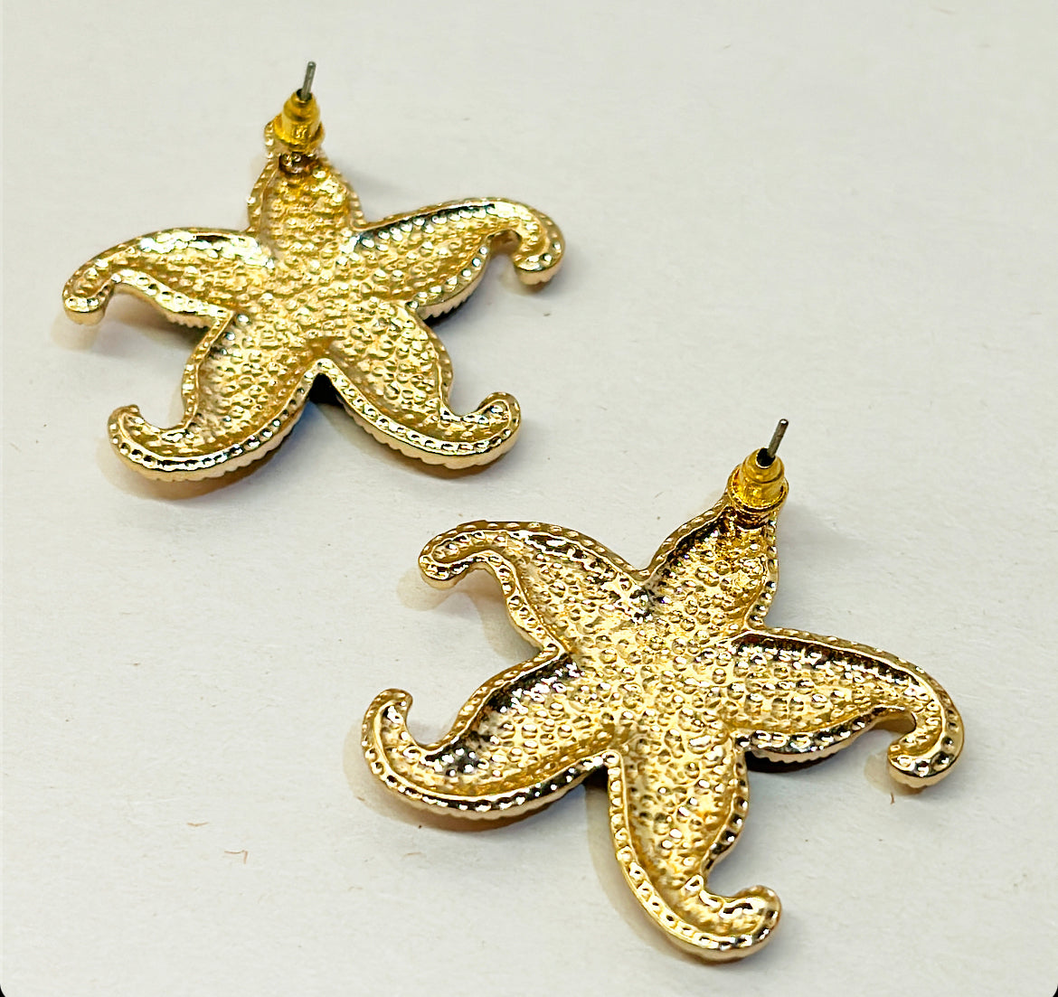 It’s almost summer … get these fabulous starfish designed pierced statement earrings.